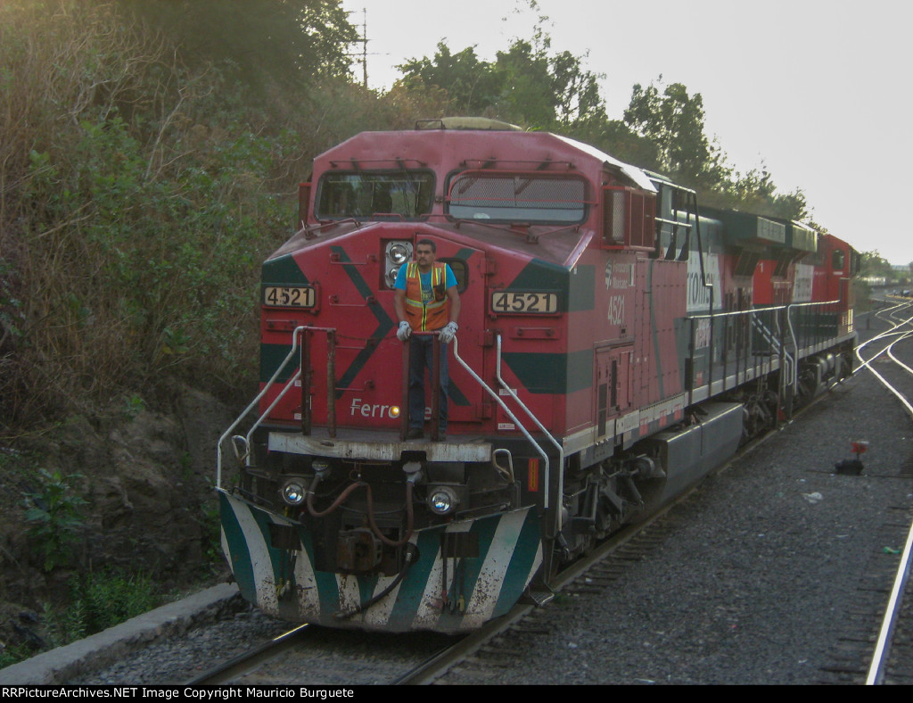 FXE AC4400 Locomotive leading a train